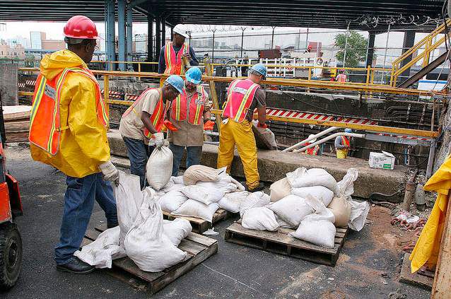 New York City Transit employees built a sea wall at Lenox Yard in Harlem to prevent water from flowing into the yard.